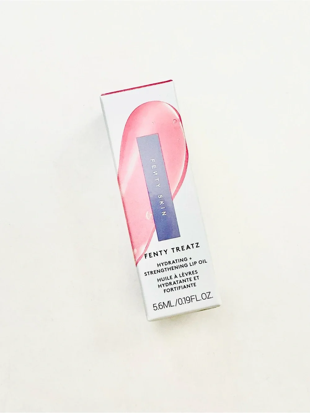 Fenty Treatz Hydrating + Strengthening Lip Oil • Dragonfruit